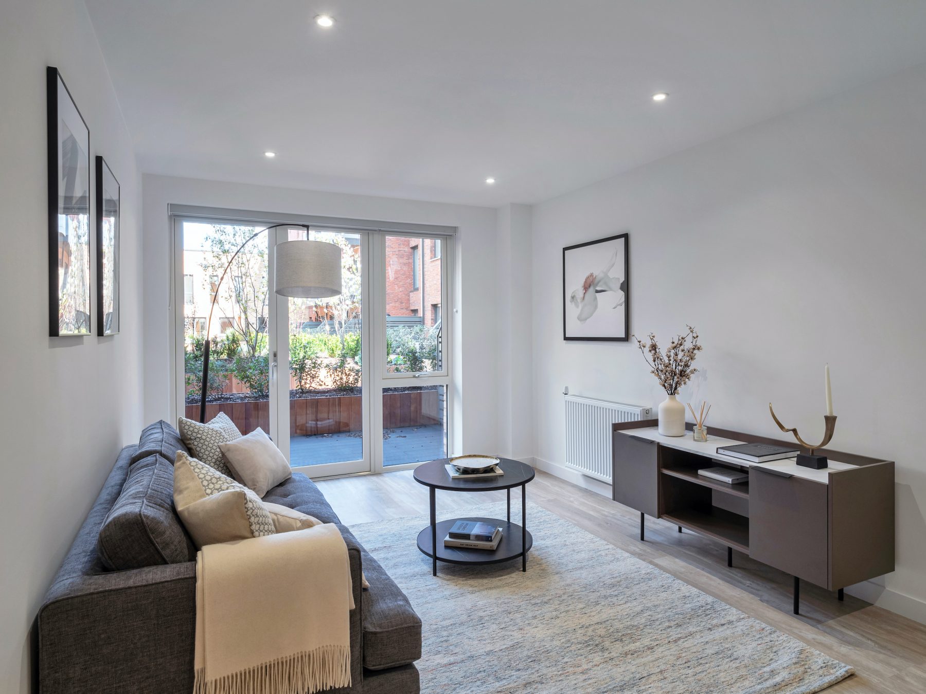 Living room with sofa coffee table and media unit at Peckham Place London